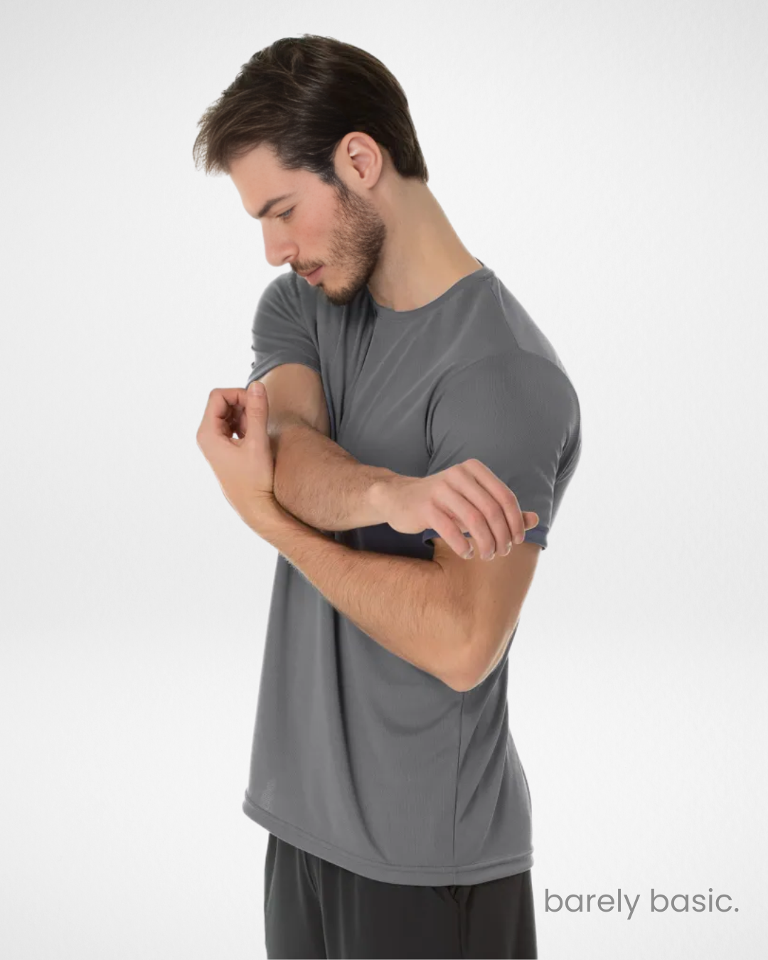 dark grey dry fit men’s athletic t-shirt with UV 30+ protection; breathable and sweat-resistant workout shirt in charcoal; performance gym shirt for men in dark grey; quick-dry sports tee in neutral dark tone; odor-resistant training shirt in dark grey