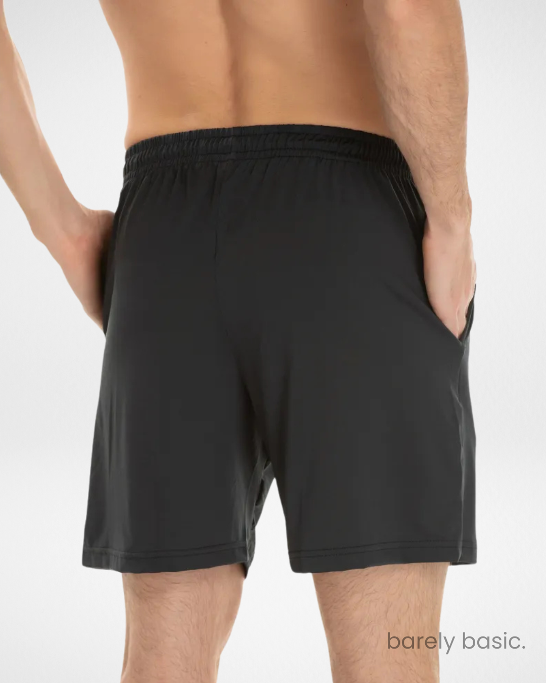 black dry fit shorts front view for men; lightweight and breathable black gym shorts; men’s black athletic shorts with elastic waistband; moisture-wicking polyester black shorts; black workout shorts with side pockets