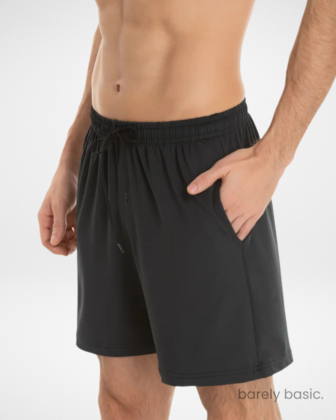 black dry fit shorts front view for men; lightweight and breathable black gym shorts; men’s black athletic shorts with elastic waistband; moisture-wicking polyester black shorts; black workout shorts with side pockets