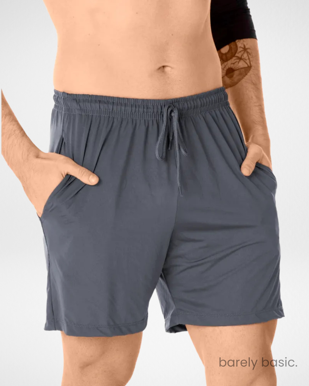 dark grey dry fit shorts for men side and front; breathable grey training shorts with relaxed fit; men’s grey athletic shorts with quick-dry technology; flexible grey shorts with drawstring waist; wrinkle-resistant men’s grey gym shorts