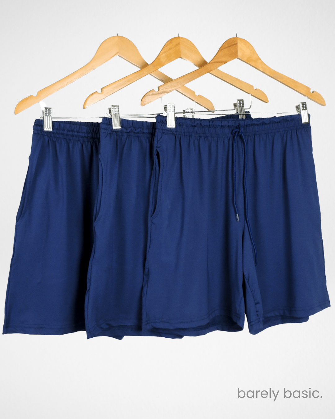 3-pack dry fit shorts for men in black, grey, and navy; men’s athletic shorts multi-color set; breathable workout shorts pack front and back; quick-drying polyester training shorts set; moisture-wicking gym shorts for men in assorted colors