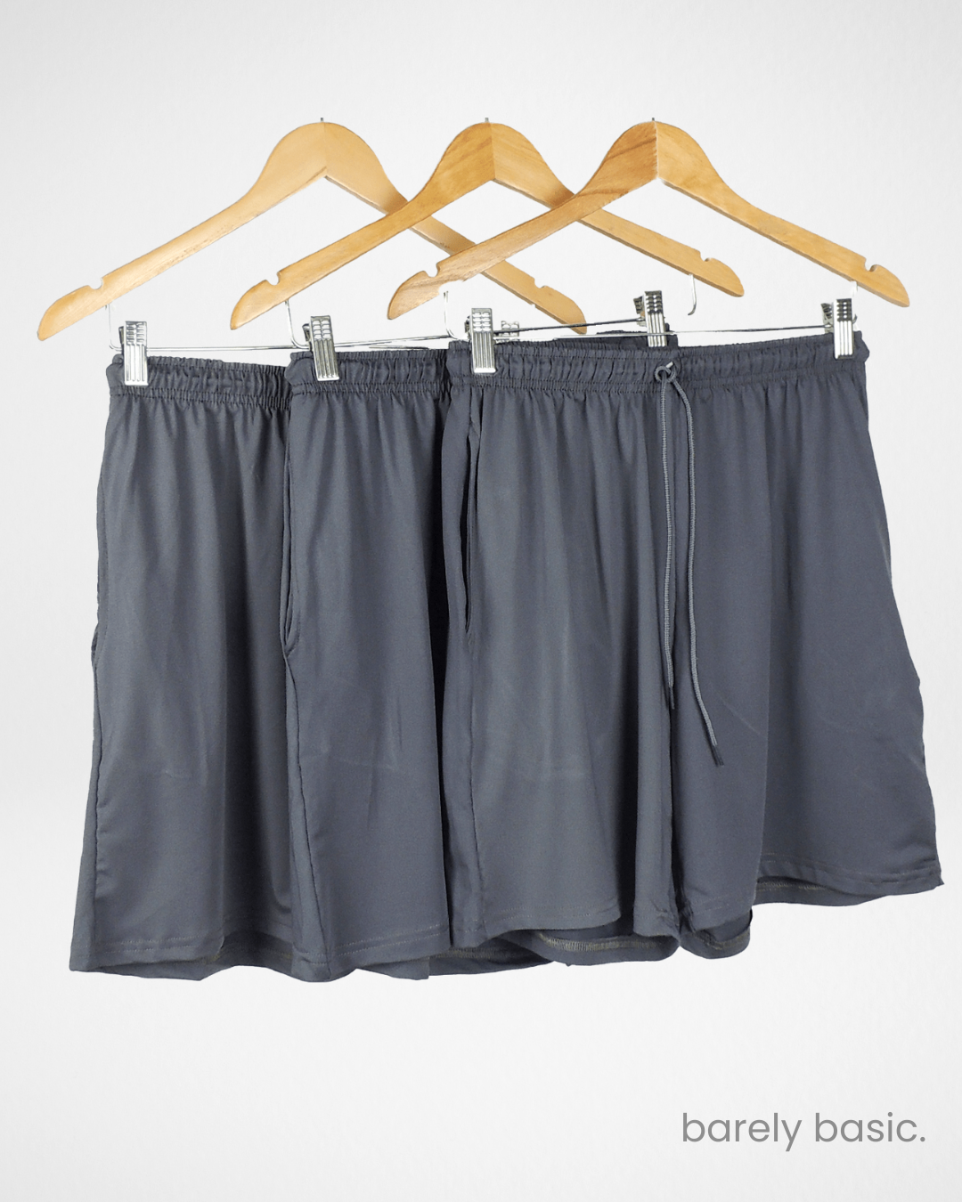 3-pack dry fit shorts for men in black, grey, and navy; men’s athletic shorts multi-color set; breathable workout shorts pack front and back; quick-drying polyester training shorts set; moisture-wicking gym shorts for men in assorted colors