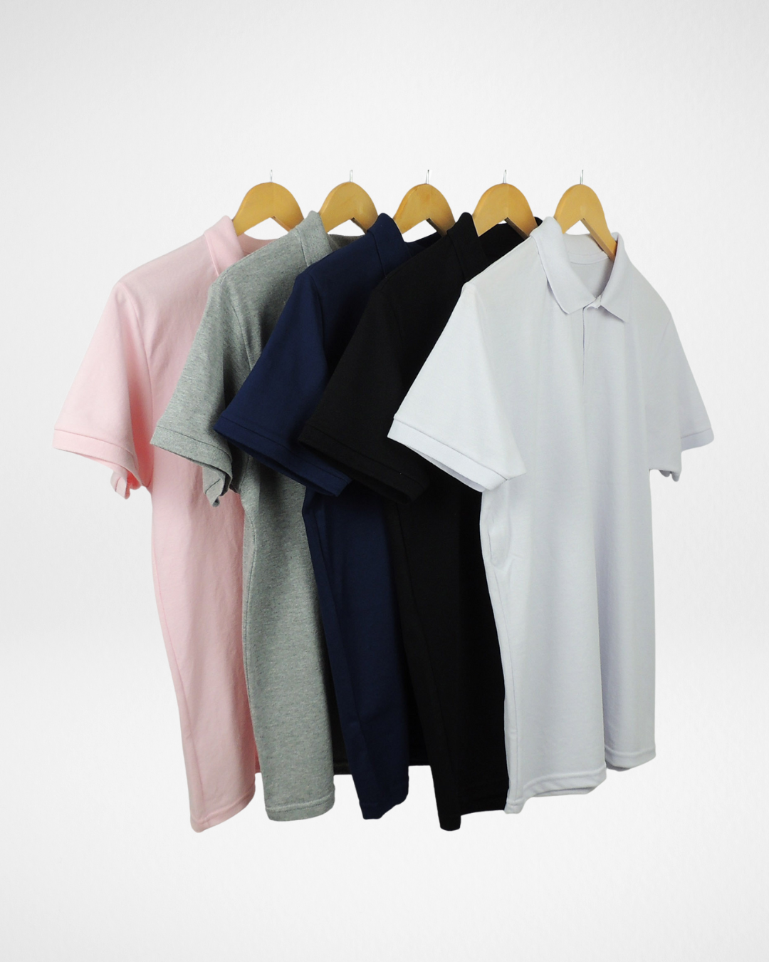 5-pack men’s piqué polo shirts in assorted colors front view; premium short sleeve polo shirts with classic collar and button placket; breathable and textured piqué fabric polos for everyday wear; tailored fit men’s polo shirts in versatile color set; stylish and comfortable cotton blend polos for casual and smart outfits