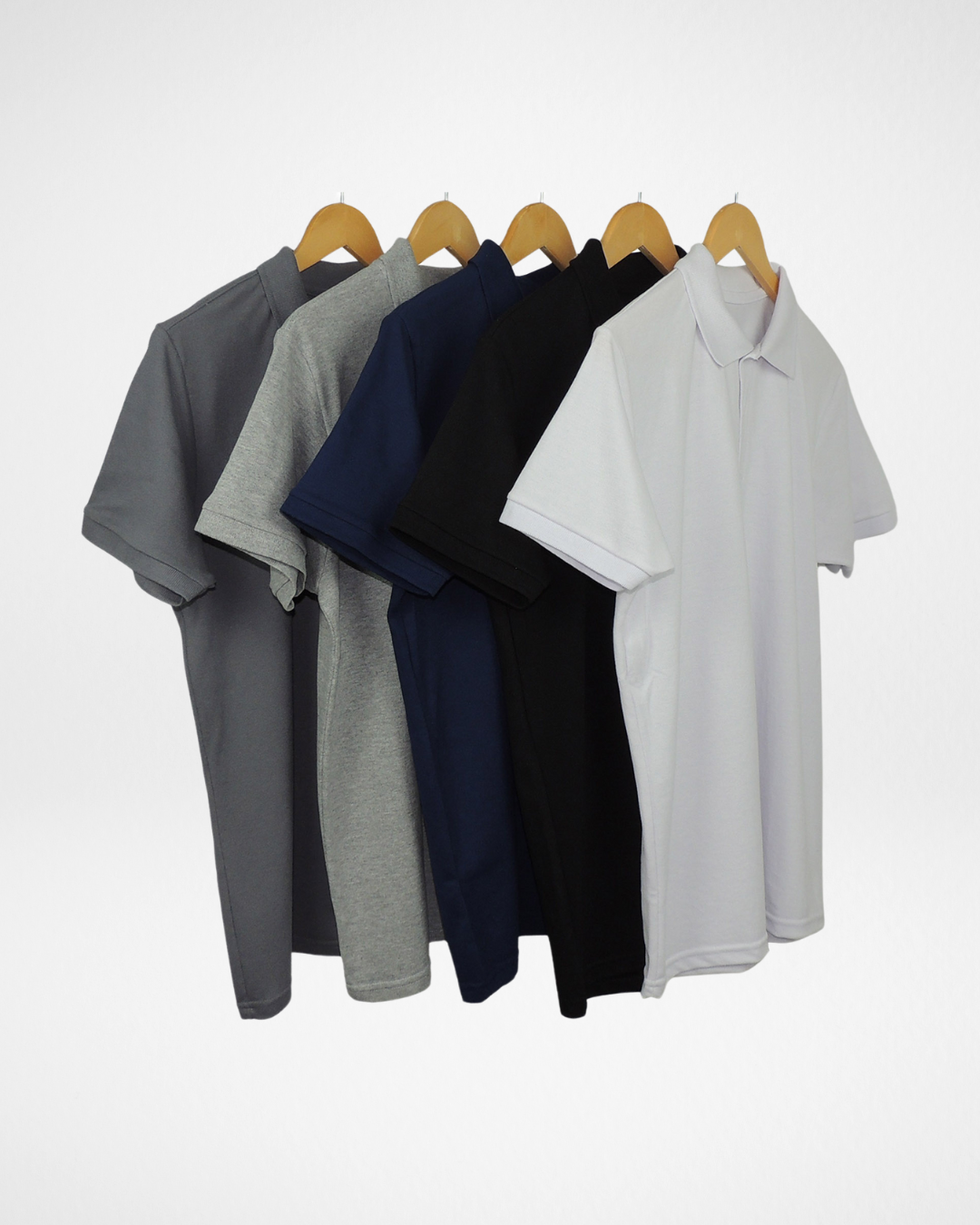 5-pack men’s piqué polo shirts in assorted colors front view; premium short sleeve polo shirts with classic collar and button placket; breathable and textured piqué fabric polos for everyday wear; tailored fit men’s polo shirts in versatile color set; stylish and comfortable cotton blend polos for casual and smart outfits