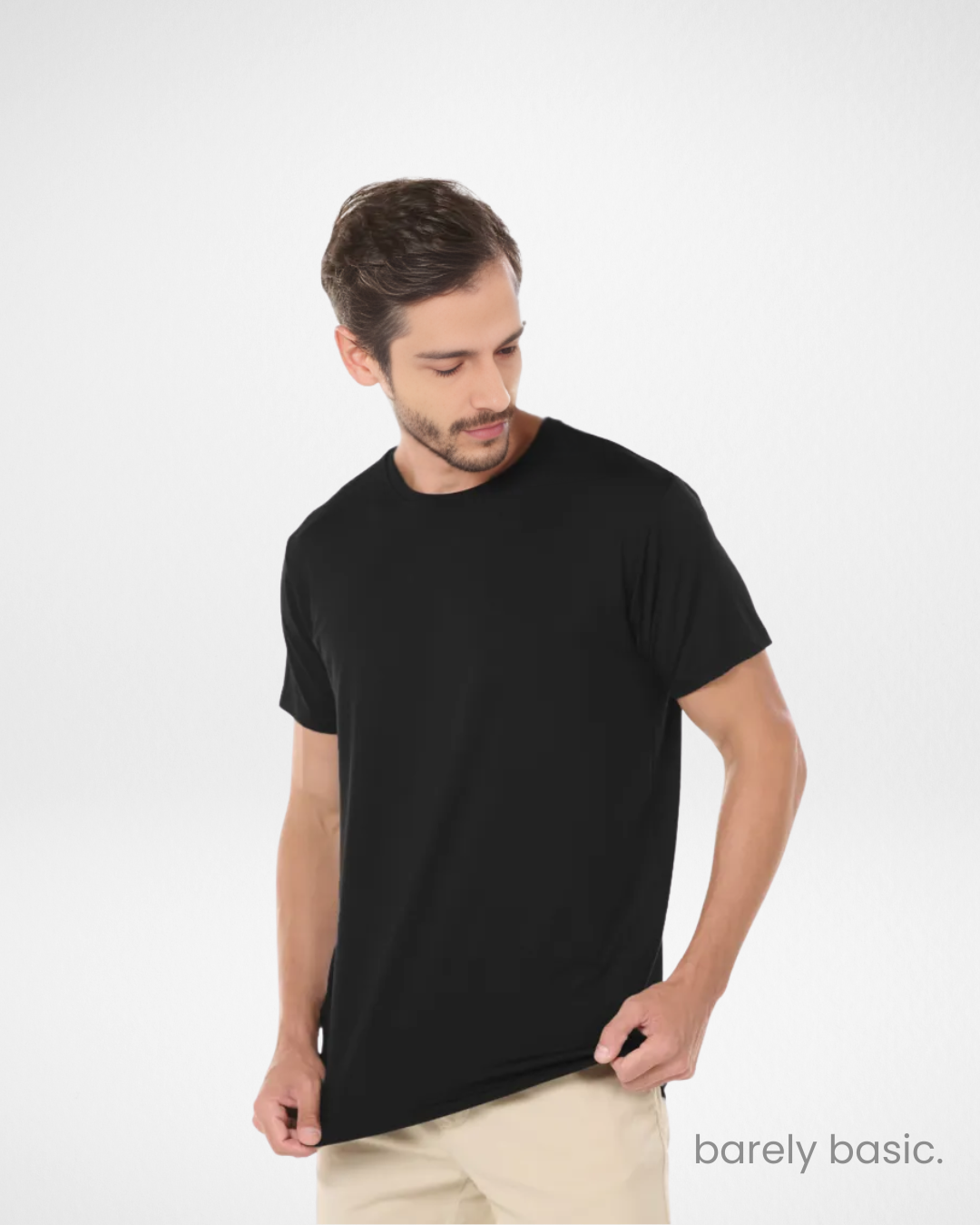 men’s black tech modal t-shirt front view; premium performance black t-shirt for men; athletic fit men’s modal shirt on model; crew neck breathable black t-shirt; soft and stretchy modal tee for men; lightweight quick-dry shirt for gym and travel; close-up of tech modal fabric texture in black; odor-resistant black t-shirt for men; sleek minimalist men’s activewear top; versatile tech shirt for everyday use