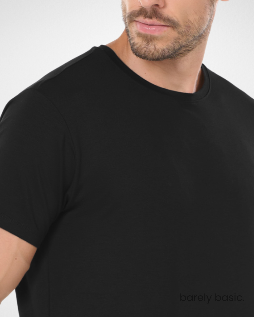 men’s black tech modal t-shirt front view; premium performance black t-shirt for men; athletic fit men’s modal shirt on model; crew neck breathable black t-shirt; soft and stretchy modal tee for men; lightweight quick-dry shirt for gym and travel; close-up of tech modal fabric texture in black; odor-resistant black t-shirt for men; sleek minimalist men’s activewear top; versatile tech shirt for everyday use