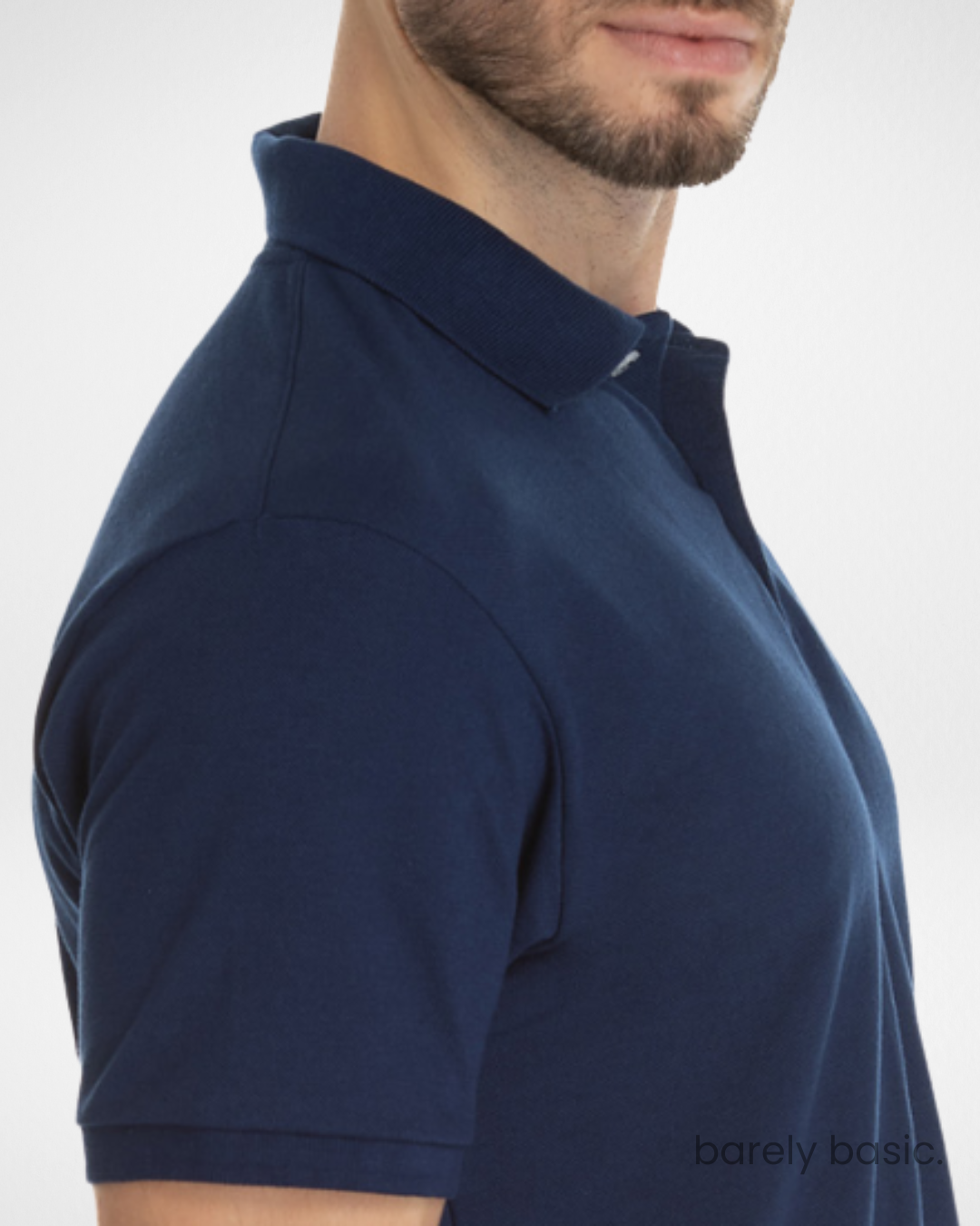 navy blue piqué polo shirt for men front view; classic navy blue short sleeve polo with ribbed details; breathable and stylish navy men’s polo shirt; smart-casual navy piqué polo for everyday use; soft textured navy blue cotton blend polo for versatile outfits
